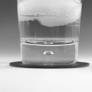 Black Linoleum Drink Coaster with Glass